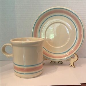 McCoy pottery pink and blue mug and saucer set.